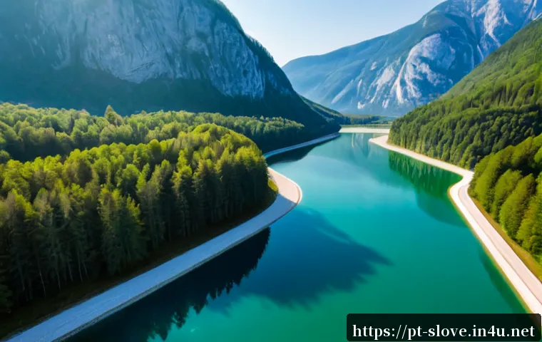 Home 17 슬로베니아 수자원 관리 정책 - Photorealistic aerial view of a pristine Slovenian alpine reservoir surrounded by dense green forest...